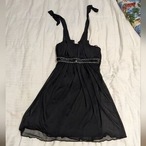 Sweet Storm little black dress with a tie top and sequins size small